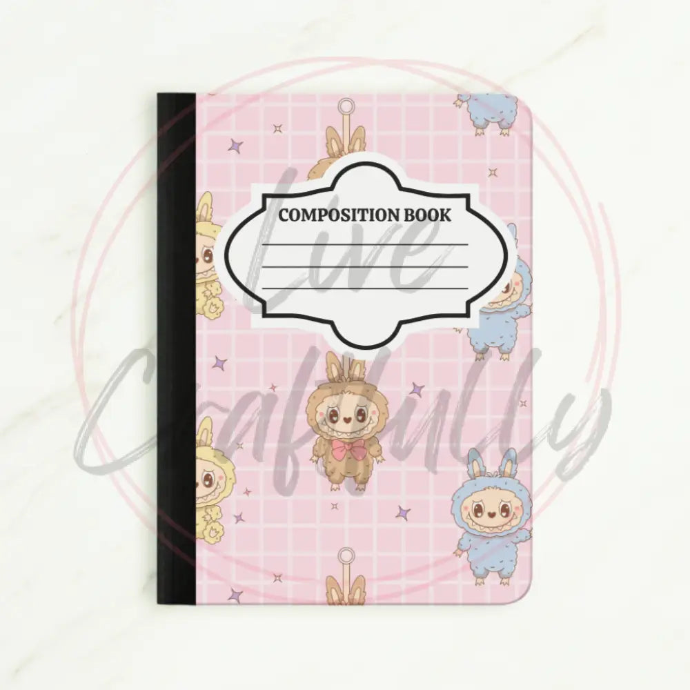 Composition book with cartoon character design on a white background